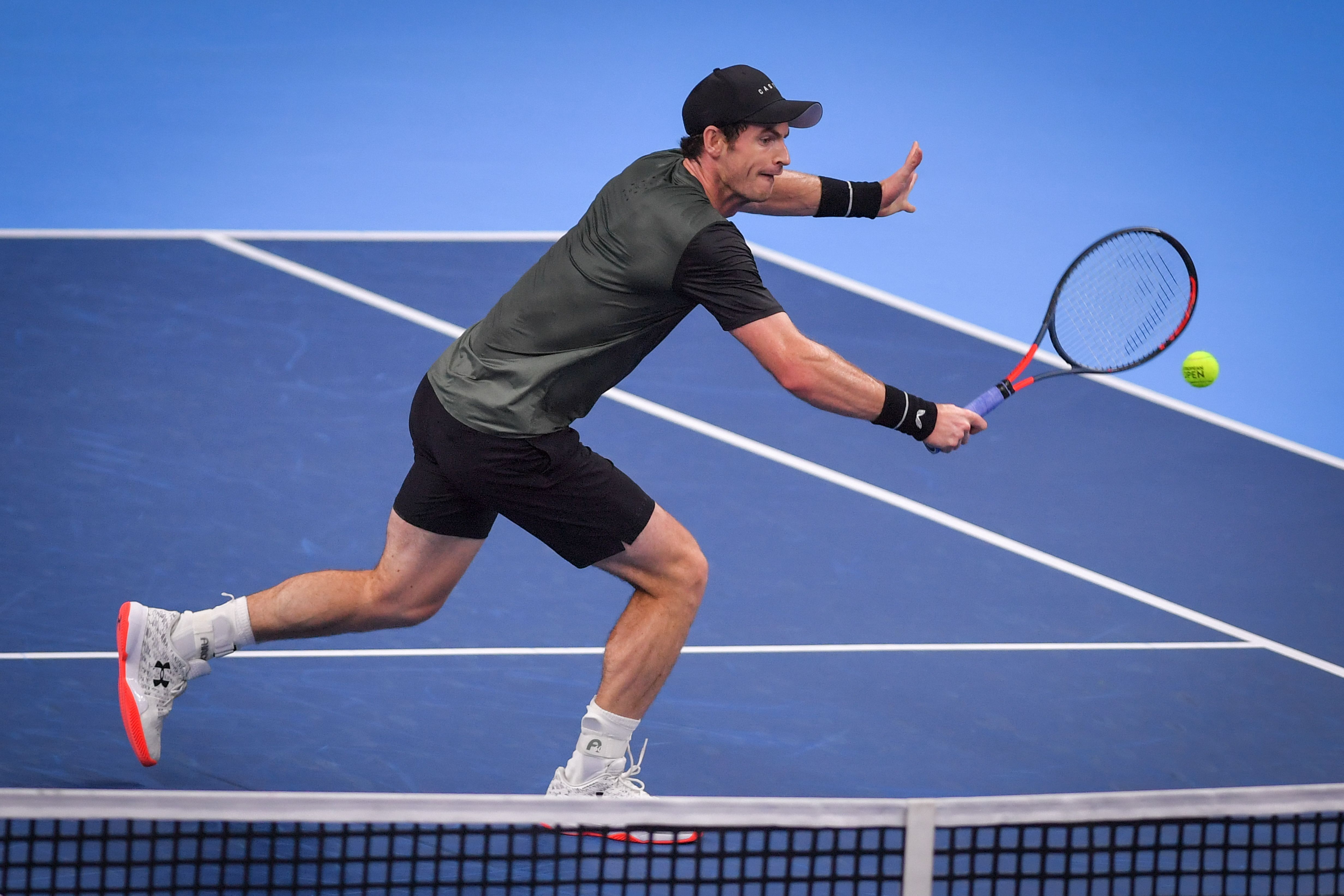 Britain's Andy Murray returns a shot during a tennis match against Uruguay's Pablo Cuevas, in the second round of the men's singles tournament at the European Open ATP Antwerp. (AFP Photo)