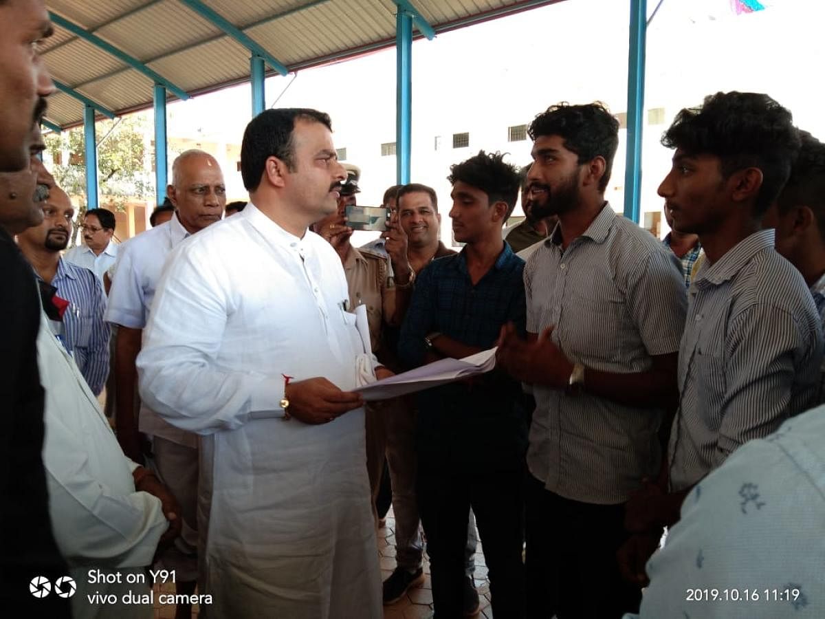 Students of Government First Grade College submit a memorandum to MLA Sunil Kumar in Hebri.