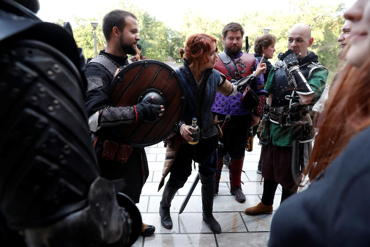 Fans of the 'Witcher' book and video game series attend a 'school' where they dress up in costumes and role play witchers fighting supernatural creatures. Picture taken October 10, 2019. Reuters