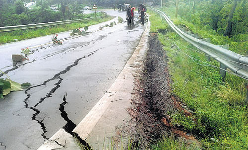 Unmotorable: The Madikeri-Suntikoppa Road has developed gaping cracks due to  incessant rains in the region. dh photo