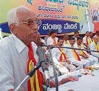 Writer M G Nagaraj, the President of the seventh Kodagu district-level Kannada Sahitya  Sammelan addressing the conference  on Wednesday.  dh photo