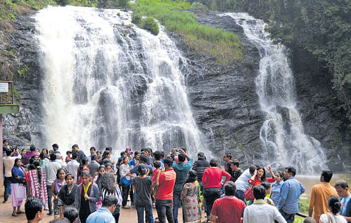 Abbey Falls near Madikeri in Kodagu district has become a dazzling sight for the tourists, following showers in the last few days. DH ph0to/Rangaswamy