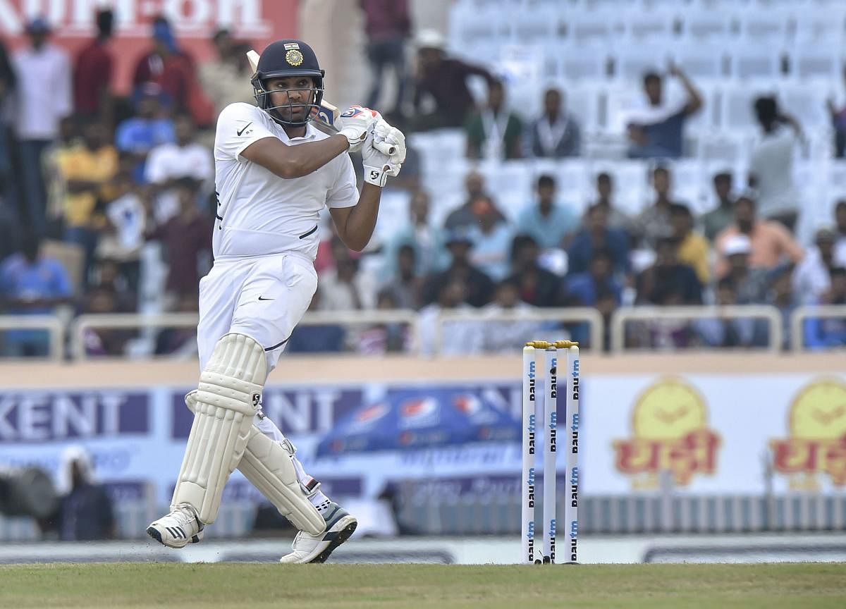 Indian batsman Rohit Sharma plays a shot during 3rd Test match between India and South Africa at JSCA Stadium in Ranchi, Saturday, Oct. 19, 2019. (PTI Photo/Ashok Bhaumik)