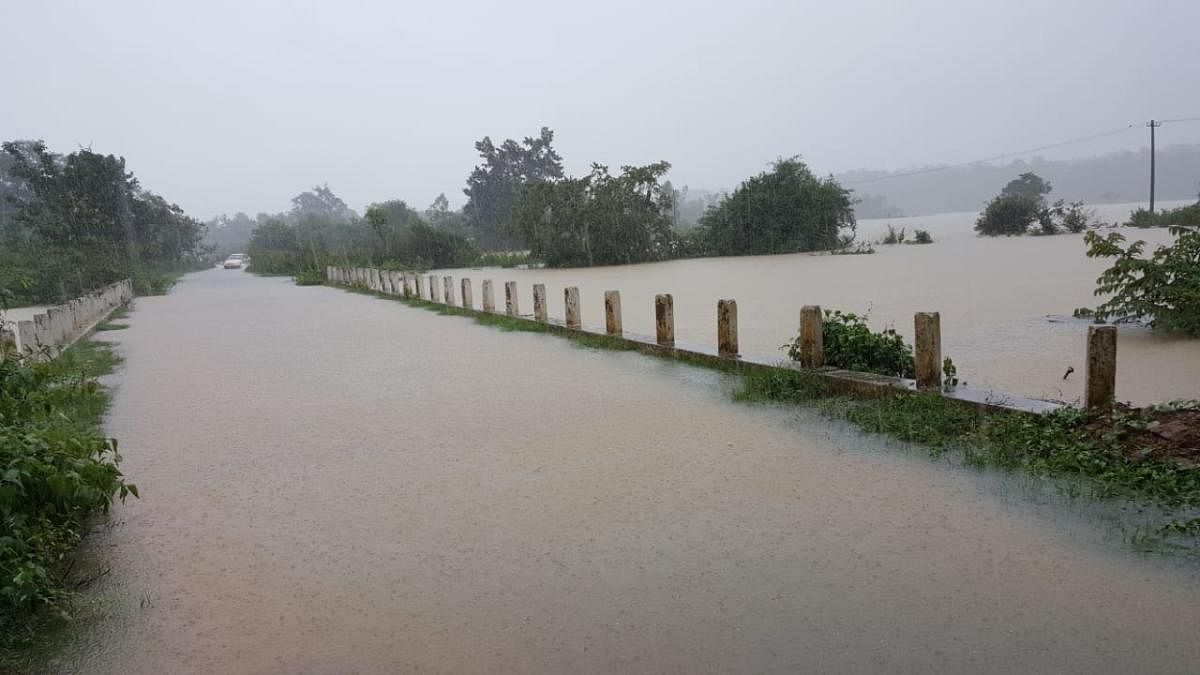 A view of inundated Kottageri-Balele bridge with water from Lakshamanatheertha river overflowing.