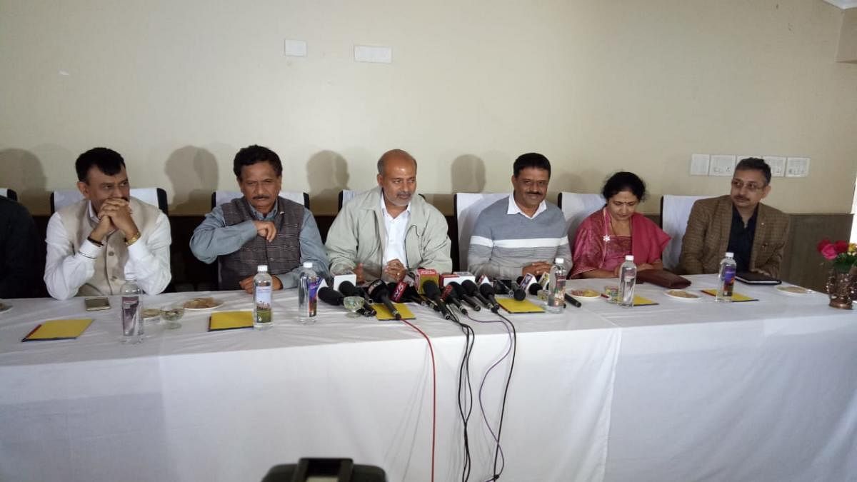 Minister for Tourism and Sericulture Sa Ra Mahesh speaks to reporters in Madikeri on Saturday.