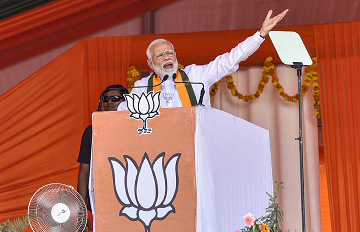 Prime Minister Narendra Modi gestures as he speaks during an election campaign rally ahead of Assembly polls in Sirsa district of Haryana. PTI