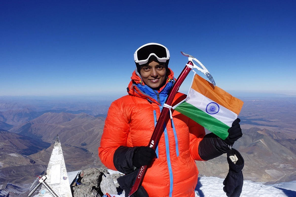 Mountaineer Bhavani waves the Indian national flag at the peak of Mount Elbrus in Russia.