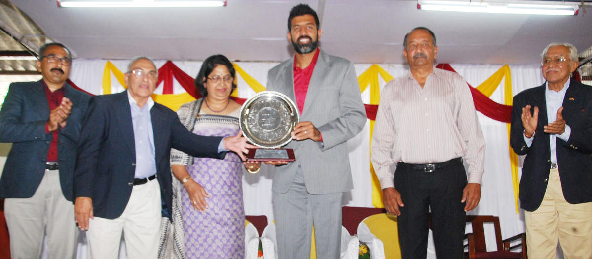 Tennis player Rohan Bopanna is felicitated during a programme held at Kodava Samaja in Madikeri on Monday.