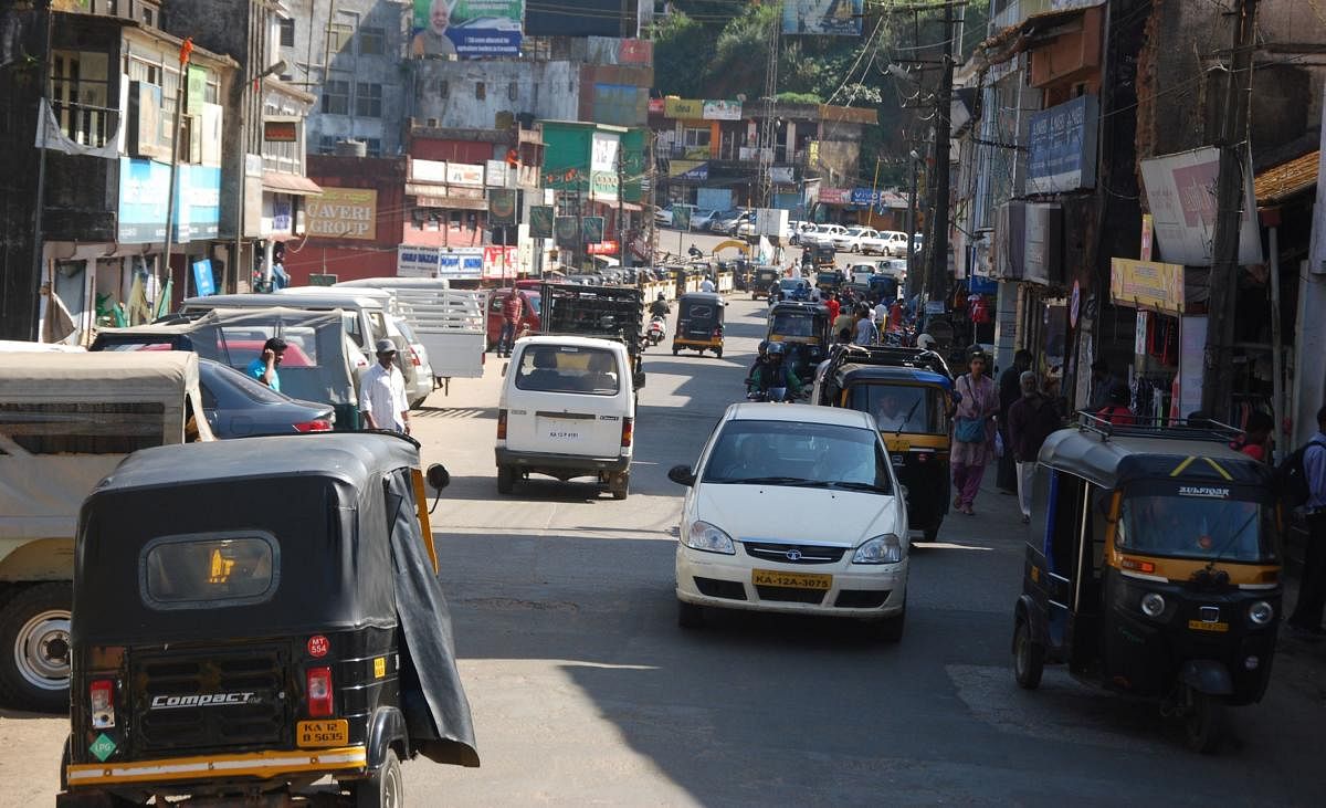 Vehicles ply about in Kodagu on the day of the nationwide bandh observed by labour unions on Tuesday.