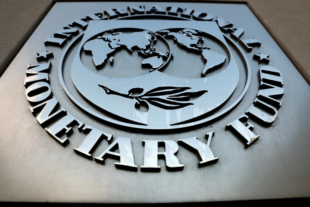 The IMF logo is seen outside the headquarters building in Washington (Photo by Reuters)