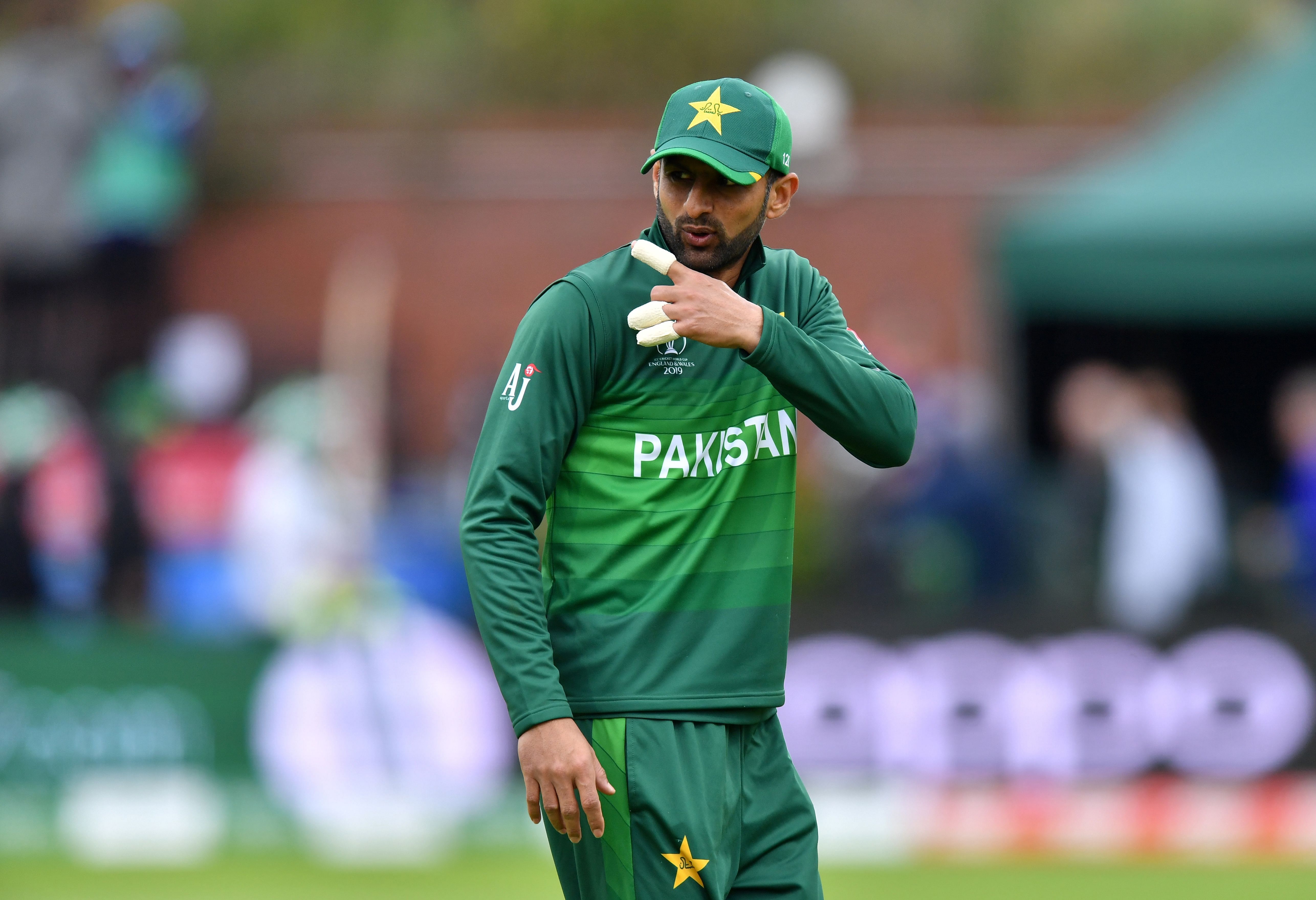 Pakistan's Shoaib Malik gestures during the 2019 Cricket World Cup group stage match between Australia and Pakistan at The County Ground in Taunton, southwest England. (AFP Photo)