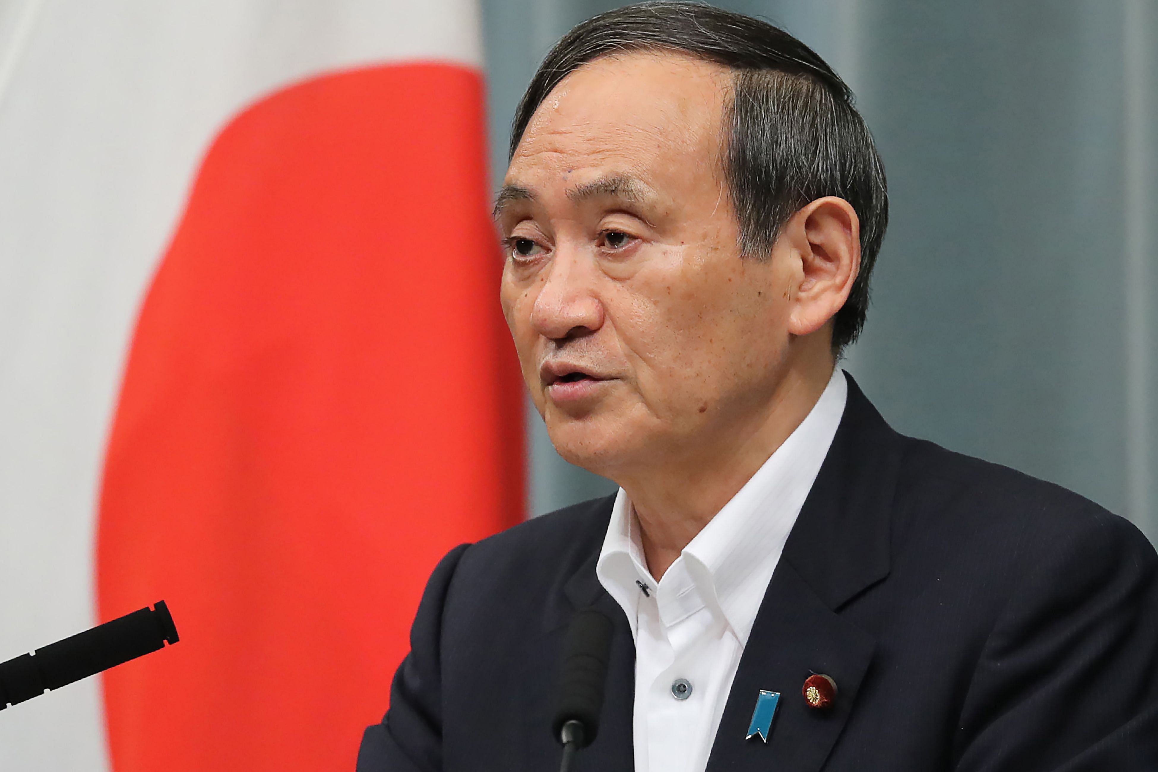 Japan's Cabinet Secretary Yoshihide Suga speaks during a press conference, after 6.8-magnitude earthquake hit the northwest of Japan, at the prime minister's official residence in Tokyo. (AFP Photo)