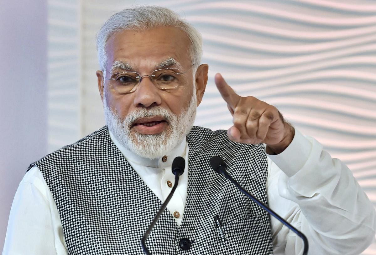It is usual for PM Modi to use social media to urge voters to cast their votes on election days. Photo/PTI