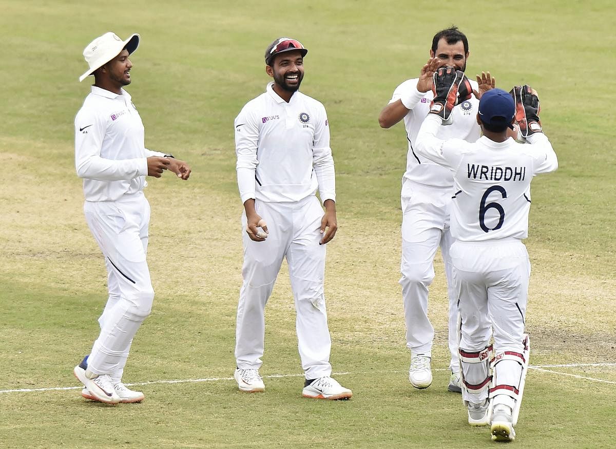  Indian bowler Mohammed Shami celebrates with teammates the wicket of South Africa's Dane Piedt during day 3 of the 3rd cricket test match at JSCA Stadium in Ranchi,Monday, Oct. 21, 2019. (PTI Photo/Ashok Bhaumik)