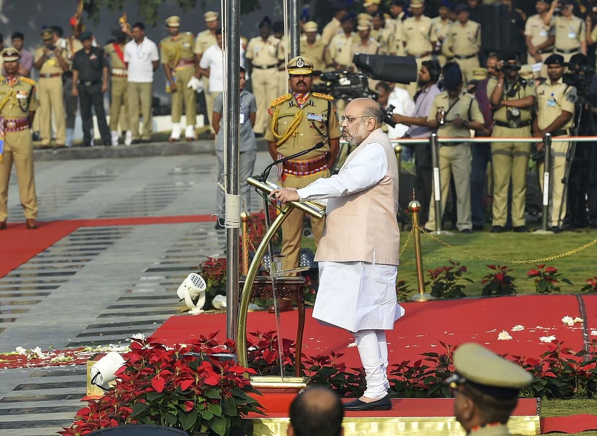  Home Minister Amit Shah addresses during Police Commemoration Day Parade at Police Memorial Ground, New Delhi (PTI Photo)