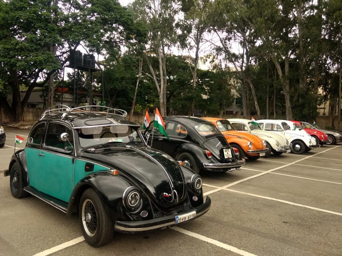 A fleet of Beetle cars parked at the Bowring Institute parking lot. 