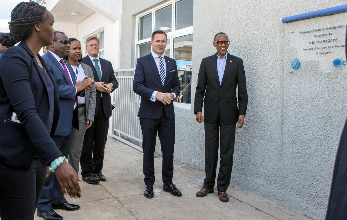 Rwanda's President Paul Kagame and Volkswagen's South Africa boss Thomas Schaefer unveil the plaque of Volkswagen's new factory in Kigali, Rwanda. Reuters file photo