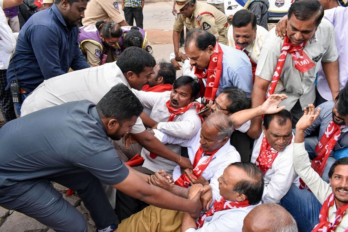Left party activists supporting Telangana State Road Transport Corporation employees during a protest at their ongoing strike. (PTI Photo)