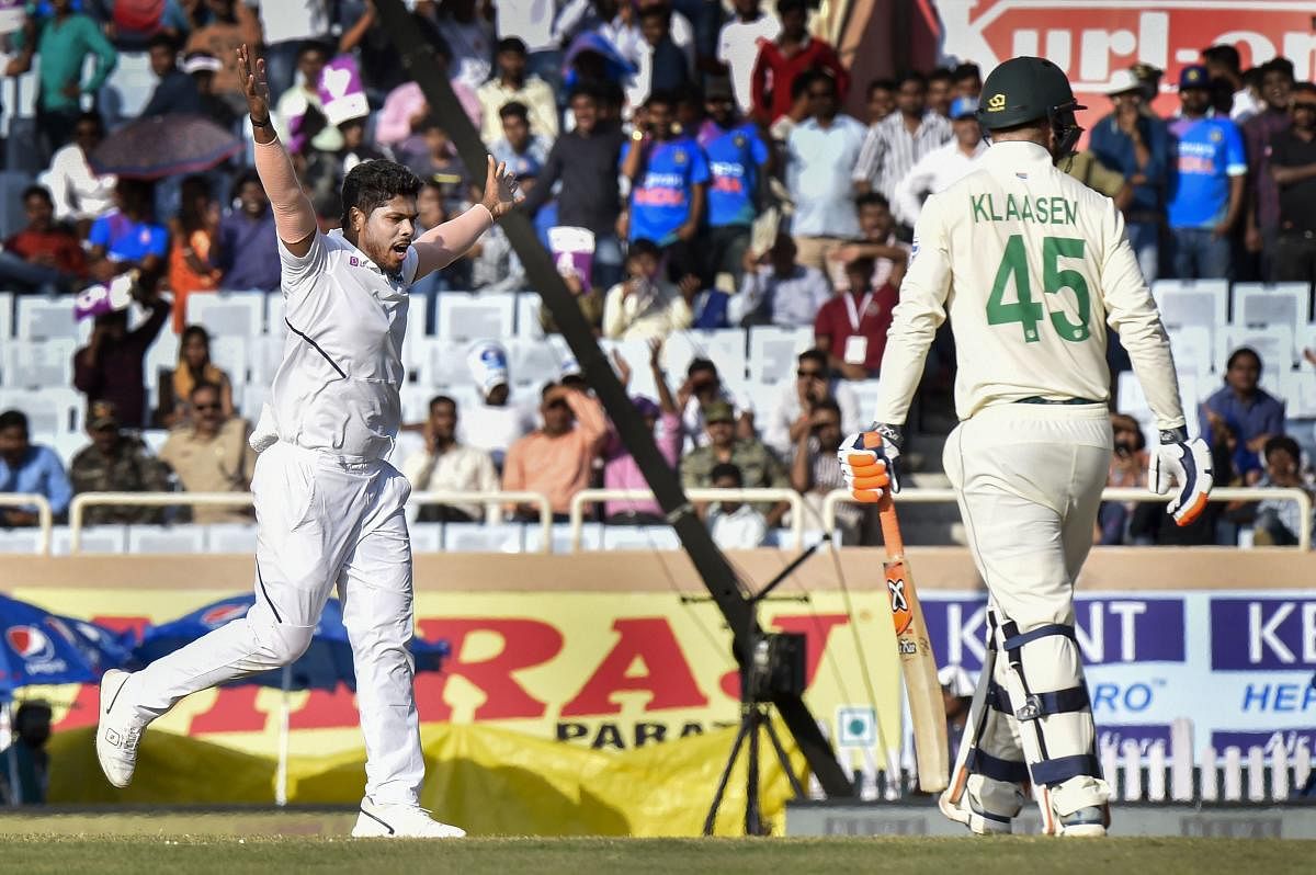 Indian bowler Umesh Yadav celebrates the dismissal of South Africa batsman Heinrich Klaasen during the third day of third and last cricket test match between India and South Africa. (PTI Photo)