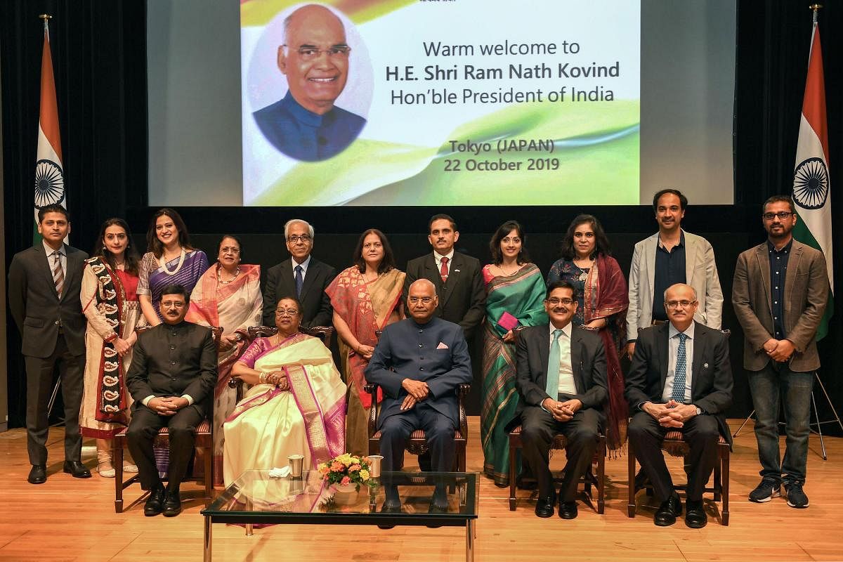 President Ram Nath Kovind, First Lady Savita Kovind, Ambassador of India to Japan Sanjay Kumar Verma and other dignitaries pose for a group photograph during an Indian community reception, in Tokyo. PTI