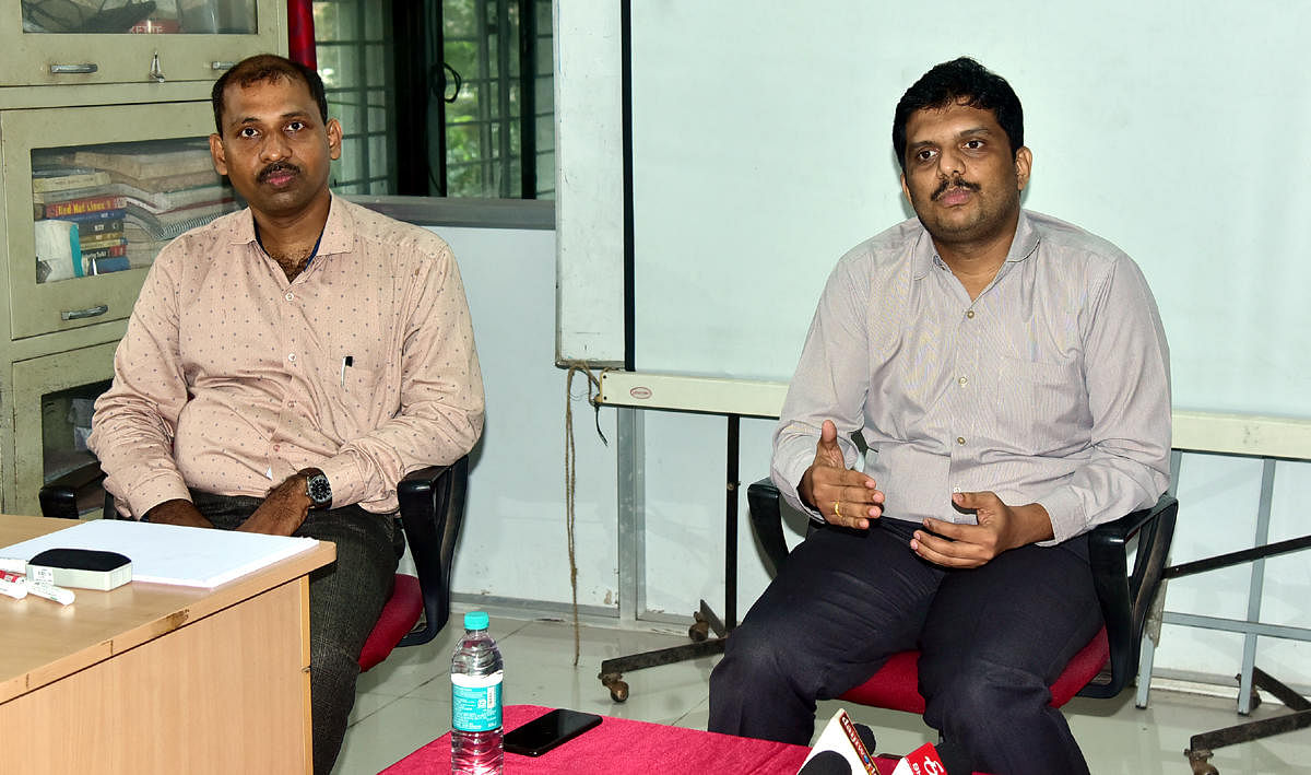 Mangaluru Division Senior Superintendent of Post Offices N Sriharsha speaks to mediapersons in Mangaluru on Tuesday. DH PHOTO