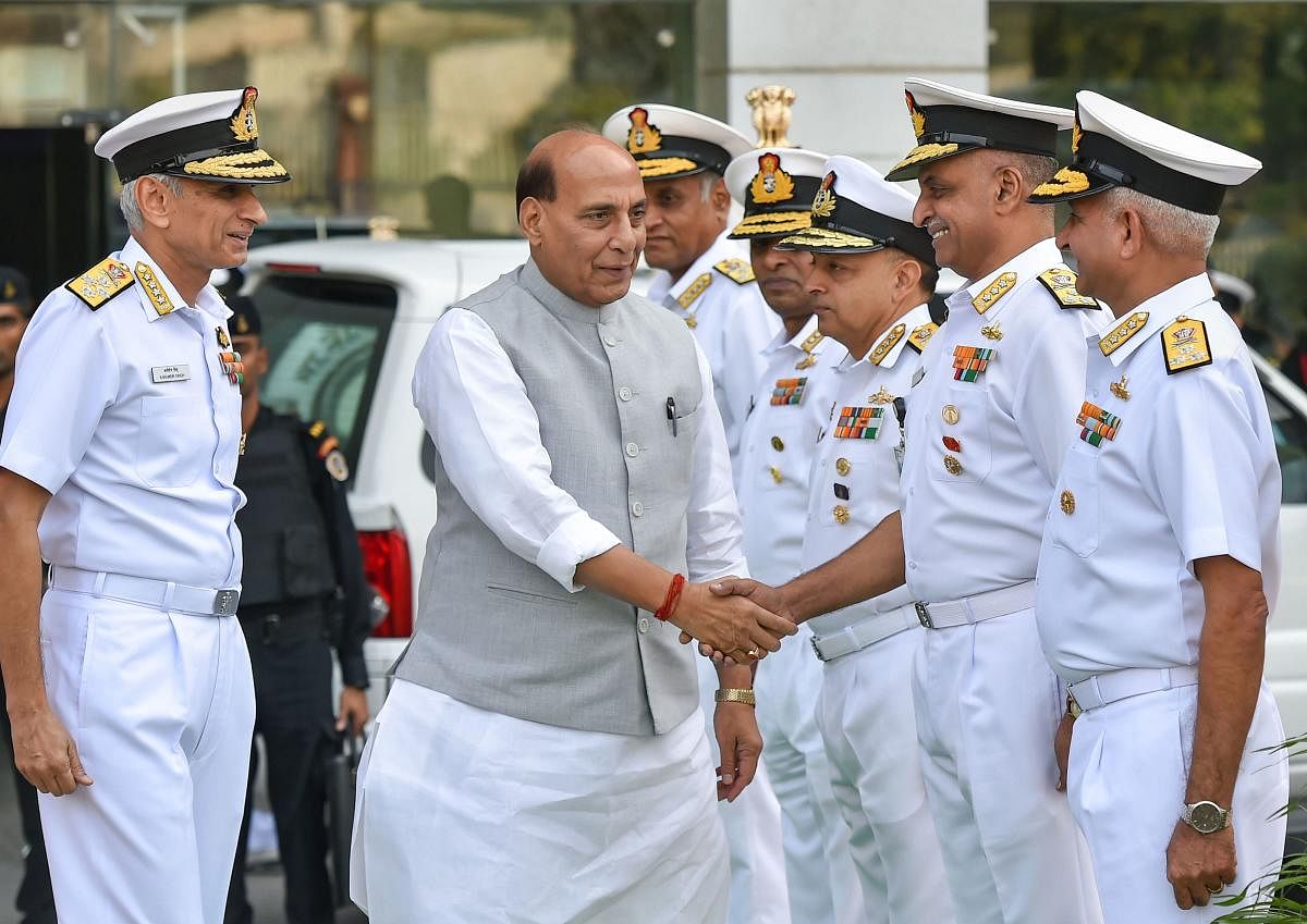  Defence Minister Rajnath Singh is greeted as he arrives for the Naval Commanders conference, in New Delhi, Tuesday, Oct. 22, 2019. Also seen is Indian Navy Chief Admiral Karambir Singh. Photo/PTI