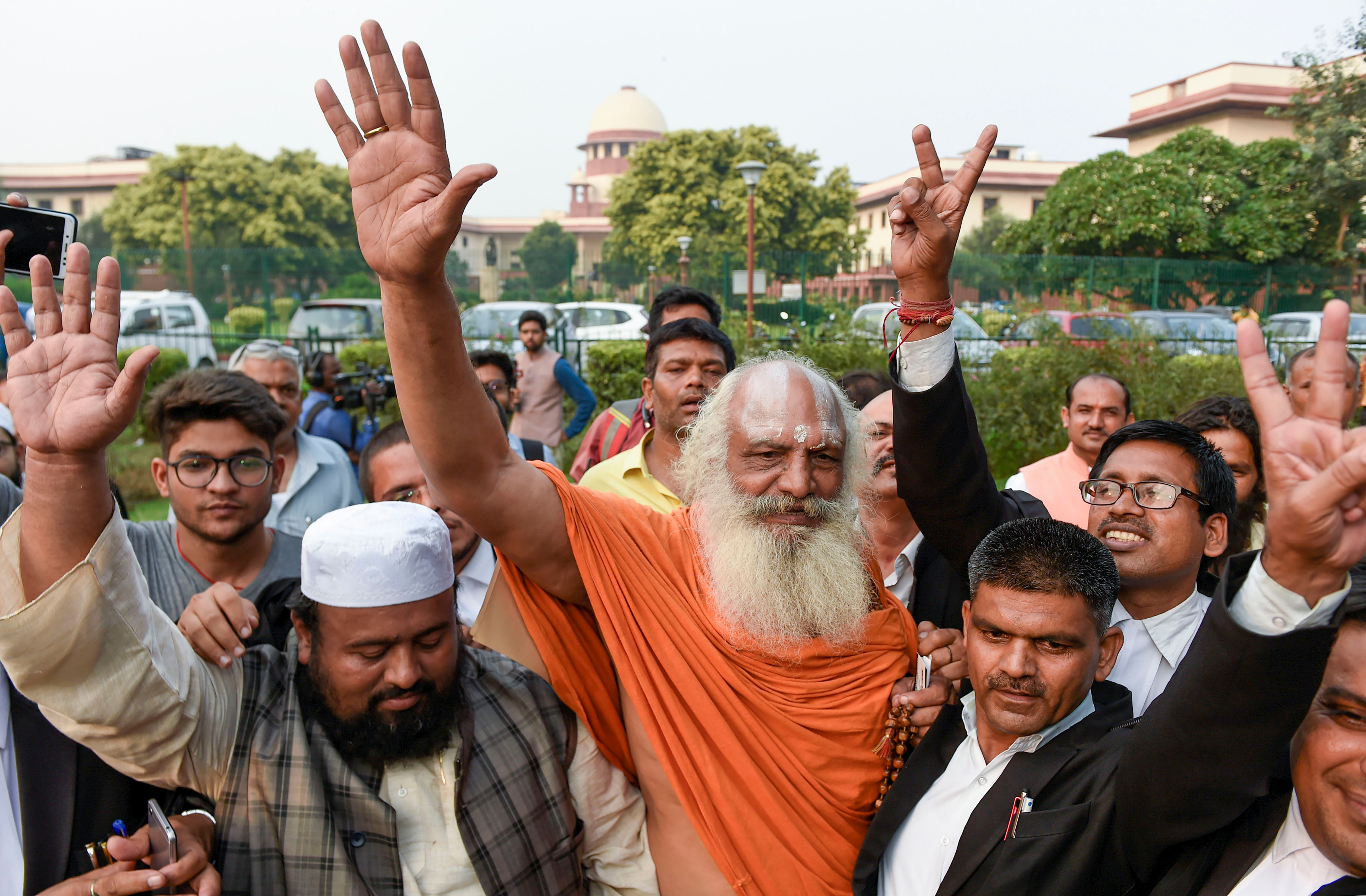 Mahant Dharam Das of the Nirwani Akhara with Jamaat Ulama-e-Hind president Molana Suhaib Qasmi at Supreme Court premises, in New Delhi. (PTI Photo)