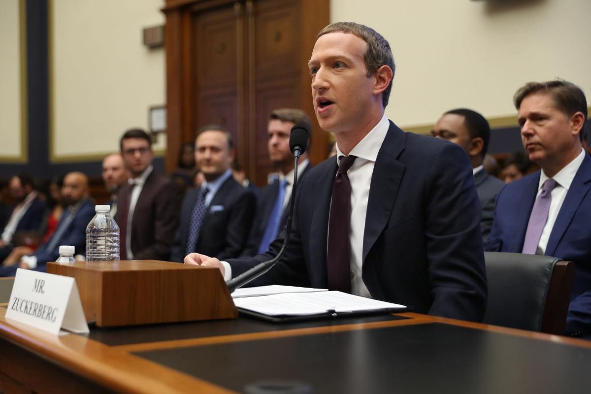 Zuckerberg, appearing at a congressional hearing on its digital coin Libra, said during questioning that the leading social network is moving forward on a project "supporting high-quality journalism." (AFP)