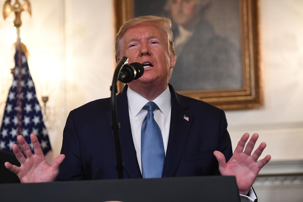 US President Donald Trump speaks about Syria in the Diplomatic Reception Room at the White House in Washington, DC, October 23, 2019. (AFP)