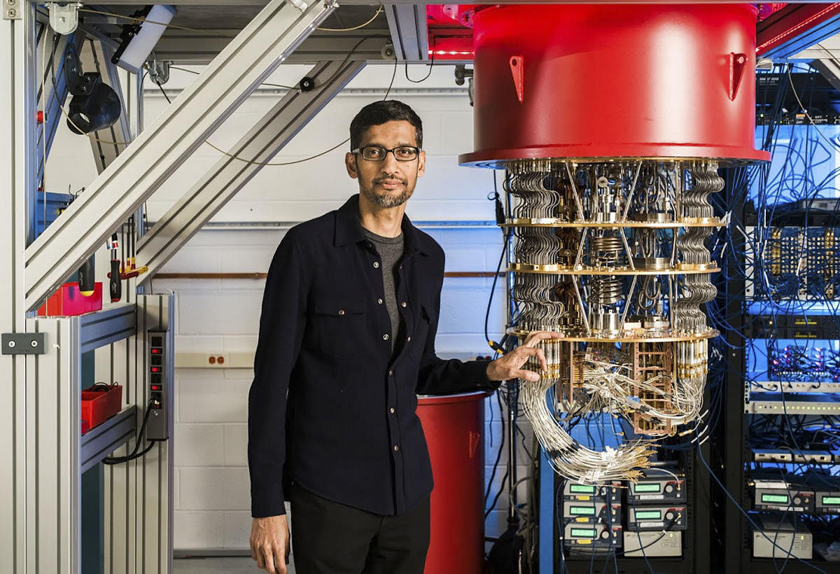 This undated handout image obtained October 23, 2019 courtesy of Google shows Sundar Pichai with one of Google's quantum computers in the Santa Barbara lab. (Photo by HO / GOOGLE / AFP)