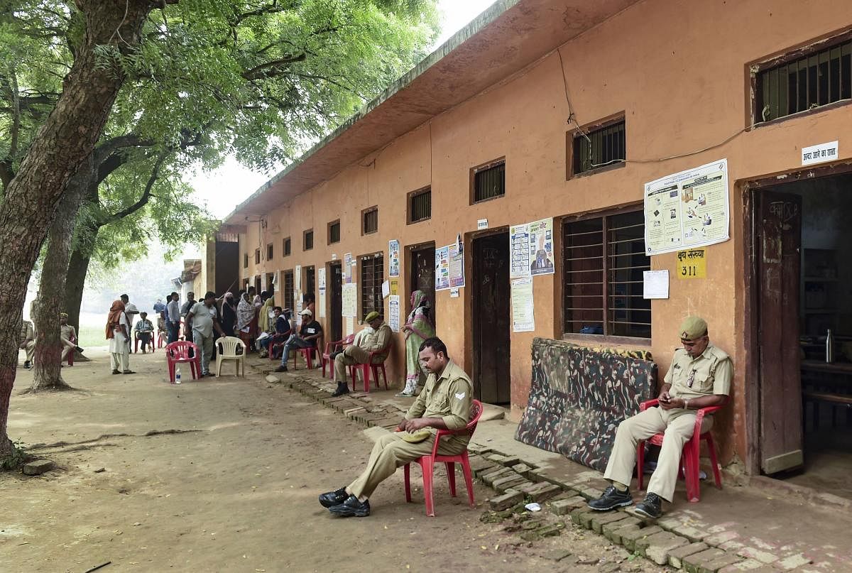On Monday, 47.05 per cent voters had exercised their franchise in the bypolls, mostly necessitated after sitting legislators got elected to the Lok Sabha in May. Photo/PTI