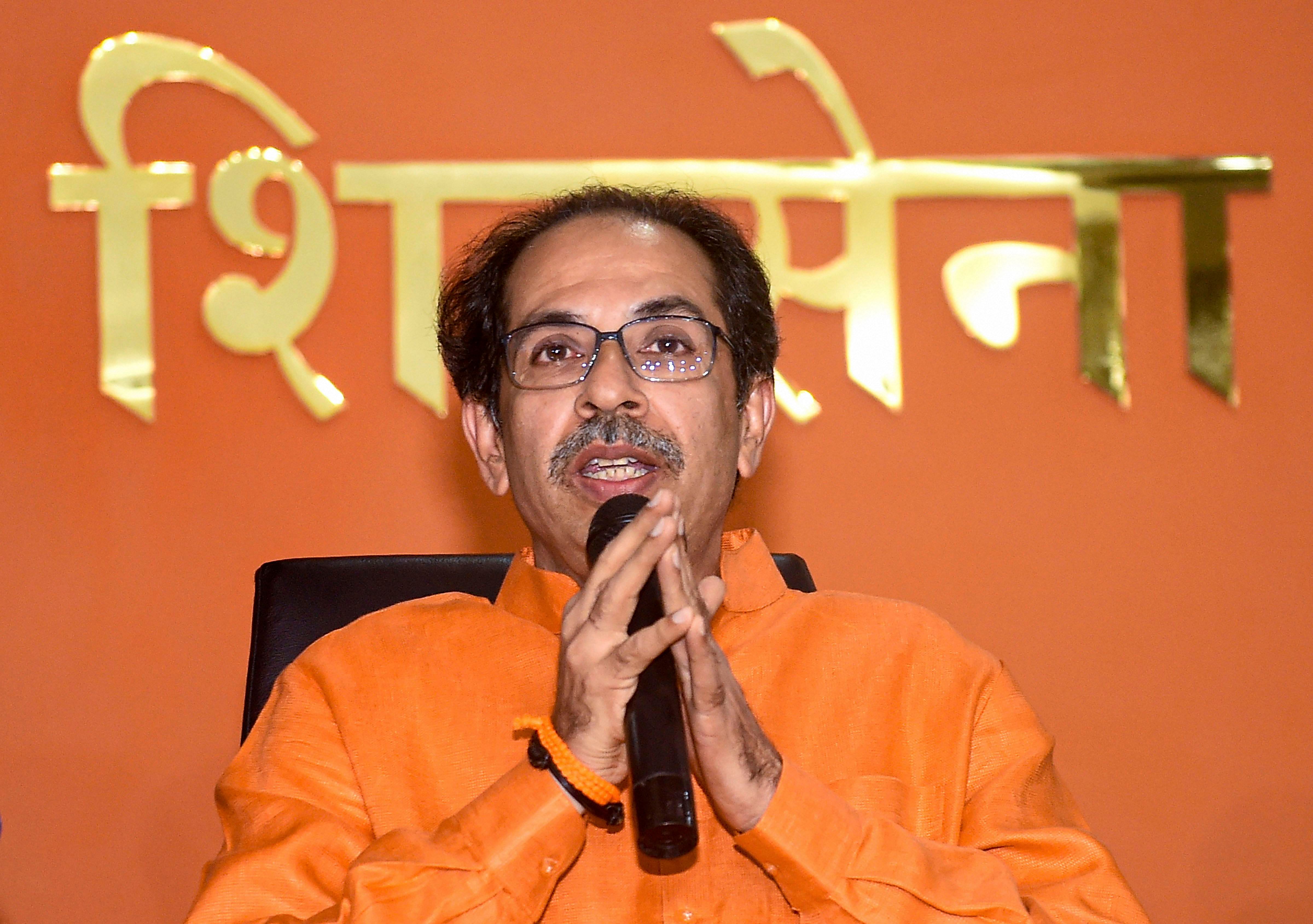 Shiv Sena chief Uddhav Thackeray speaks during a press conference at Sen Bhavan in Mumbai. (PTI Photo)