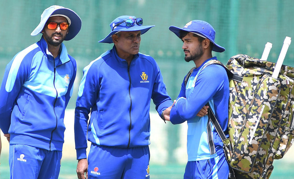 Skipper Manish Pandey, coach Yere Goud and bowling coach S Arvind (from right) in deep discussion during Karnataka’s training session ahead of their Vijay Hazare Trophy final against Tamil Nadu. DH PHOTO/ SRIKANTA SHARMA R