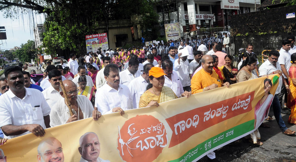 Udupi-Chikmagalur MP Shobha Karandlaje takes part in the 'Gandhi Sankalp Yatra' launched from Bhujanga Park in Ajjarakad on Thursday.