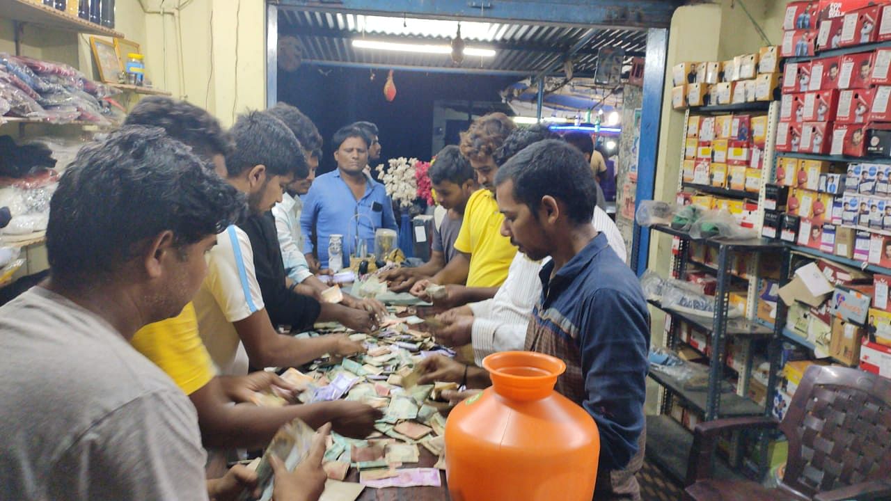 Khajavali's friends in Anantasagar with the money collected for the treatment. (DH photo)