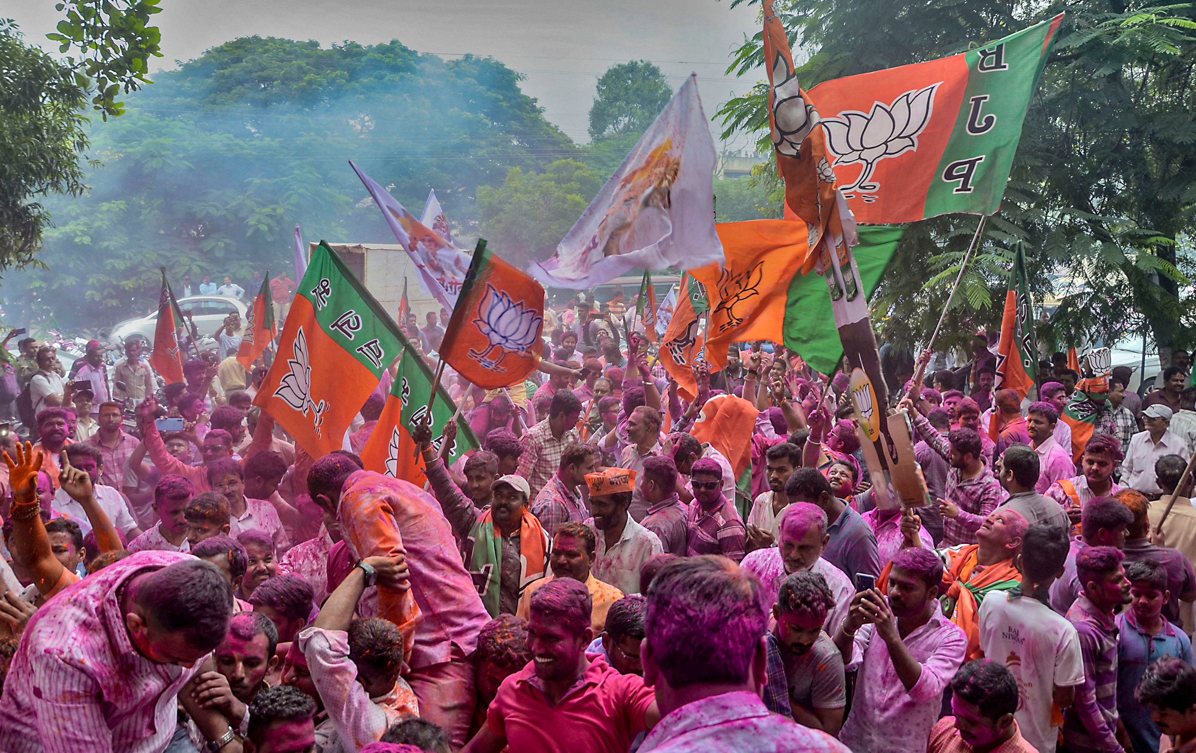 BJP party workers celebrate BJP's victory in Maharashatra's Assembly election at Sangli. (PTI PHoto)