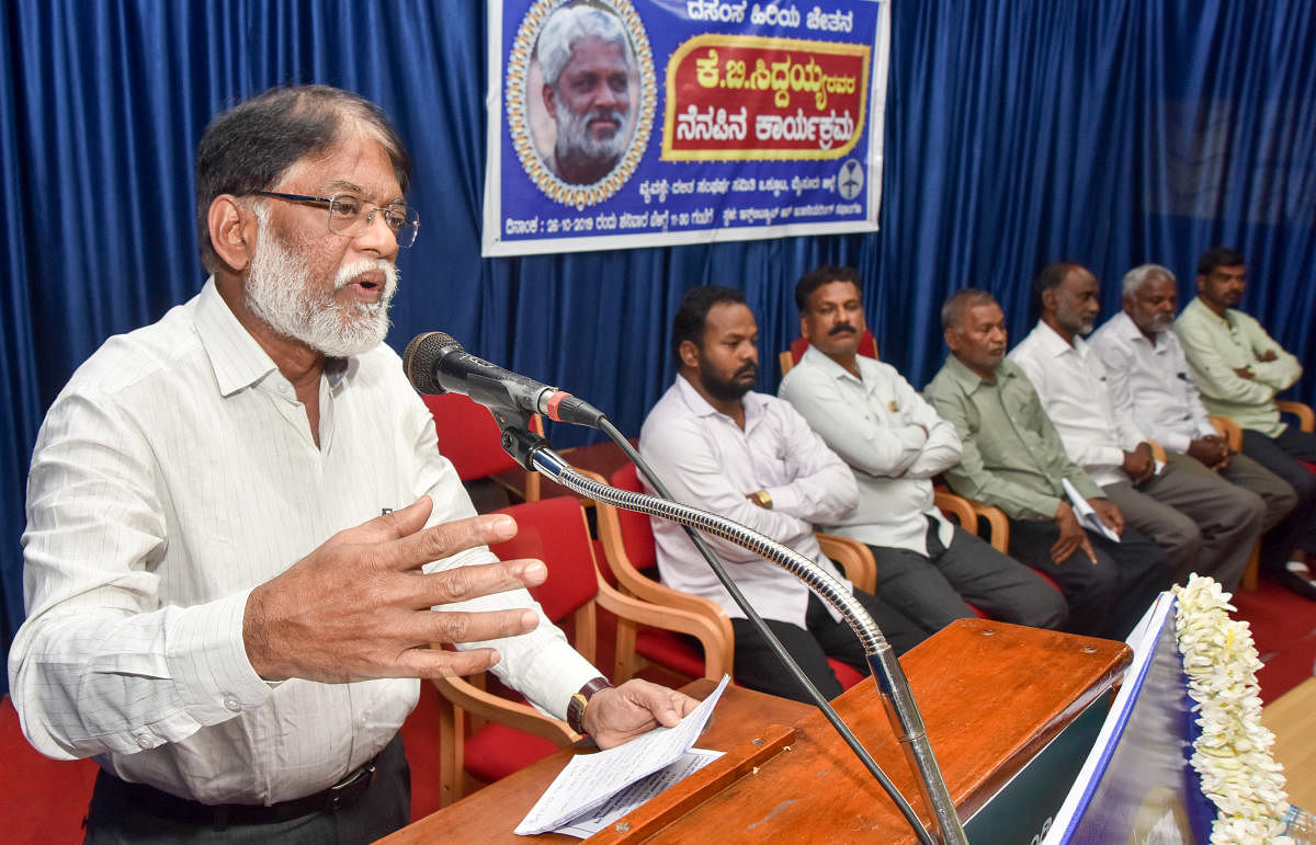 Writer S Tukaram speaks at a memorial programme of poet-Dalit activist K B Siddaiah, organised by the Union of Dalit Sangharsh Samitis, in Mysuru on Saturday. dh photo