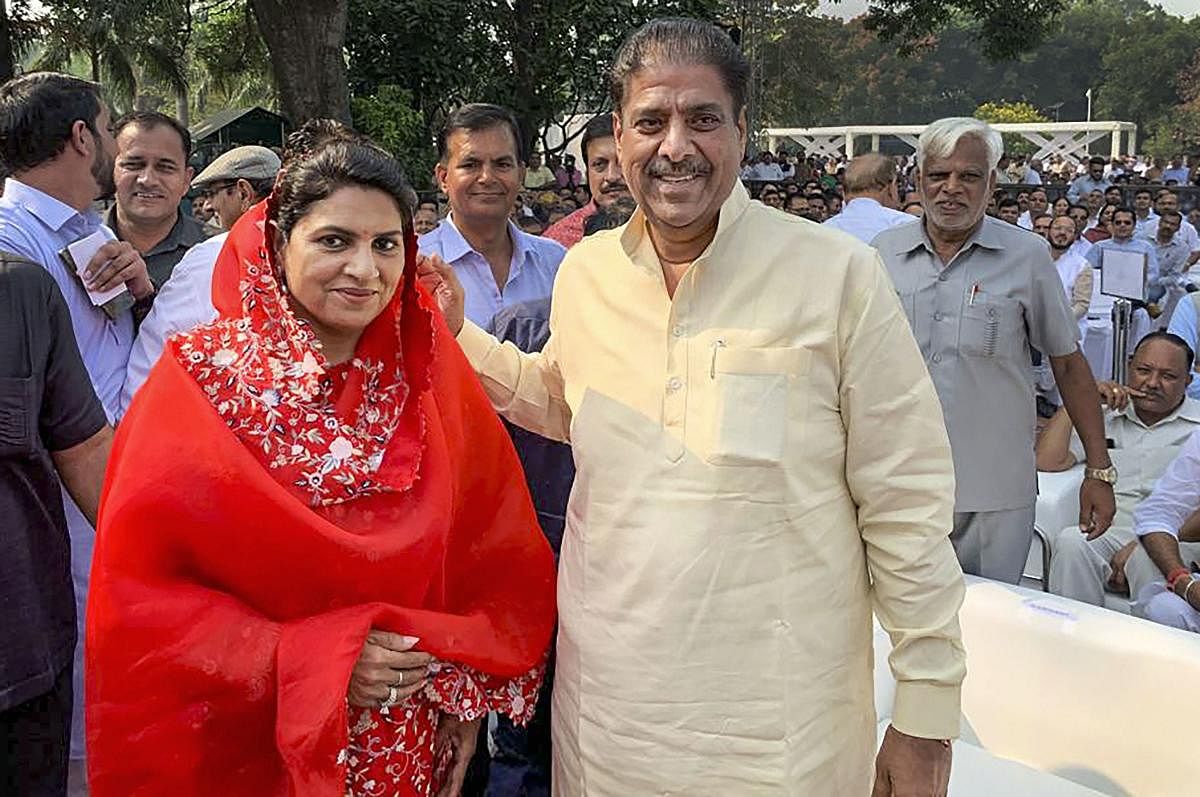 Jannayak Janta Party leader Dushyant Chautala's father Ajay Chautala and mother Naina Singh Chautala arrive to attend the swearing-in ceremony of their son as Deputy Chief Minister of Haryana, in Chandigarh, Sunday, Oct. 27, 2019. (PTI Photo)