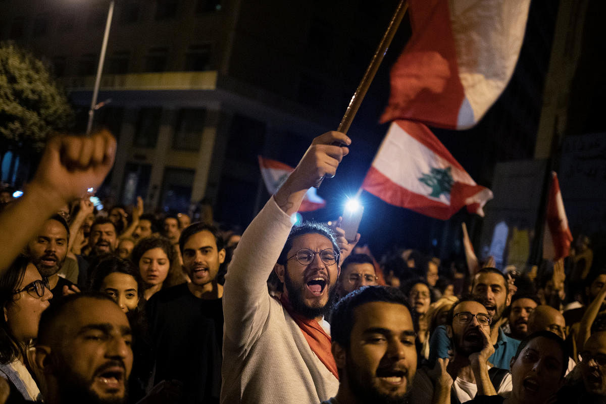 Demonstrators shout slogans during ongoing anti-government protests in downtown Beirut, Lebanon, October 26, 2019. REUTERS/Alkis Konstantinidis