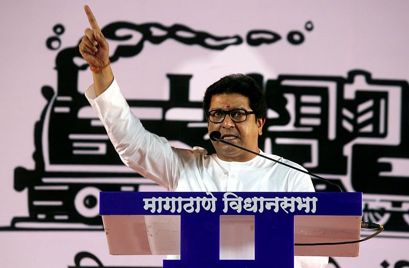 Maharashtra Navnirman Sena chief Raj Thackeray addresses a public meeting during a rally for the upcoming Assembly elections, at Borivali in Mumbai. (PTI Photo)