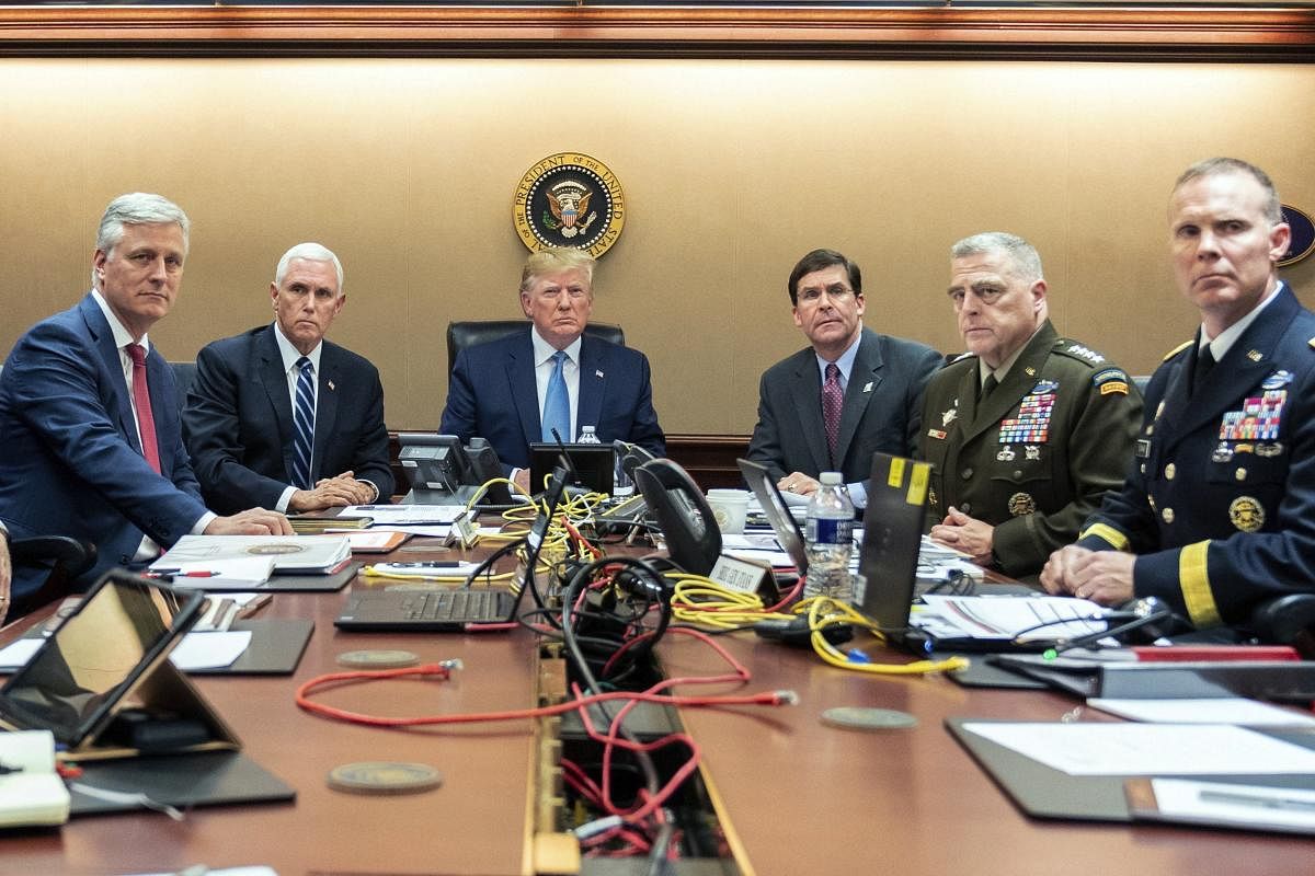  In this photo provided by the White House, President Donald Trump is joined by from left, national security adviser Robert O'Brien, Vice President Mike Pence, Defense Secretary mark Esper, Joint Chiefs Chairman Gen. Mark Milley and Brig. Gen. Marcus Evans, Deputy Director for Special Operations on the Joint Staff, Saturday, Oct. 26, 2019, in the Situation Room of the White House in Washington. monitoring developments as in the U.S. Special Operations forces raid that took out Islamic State leader Abu Bakr al-Baghdadi. AP/PTI