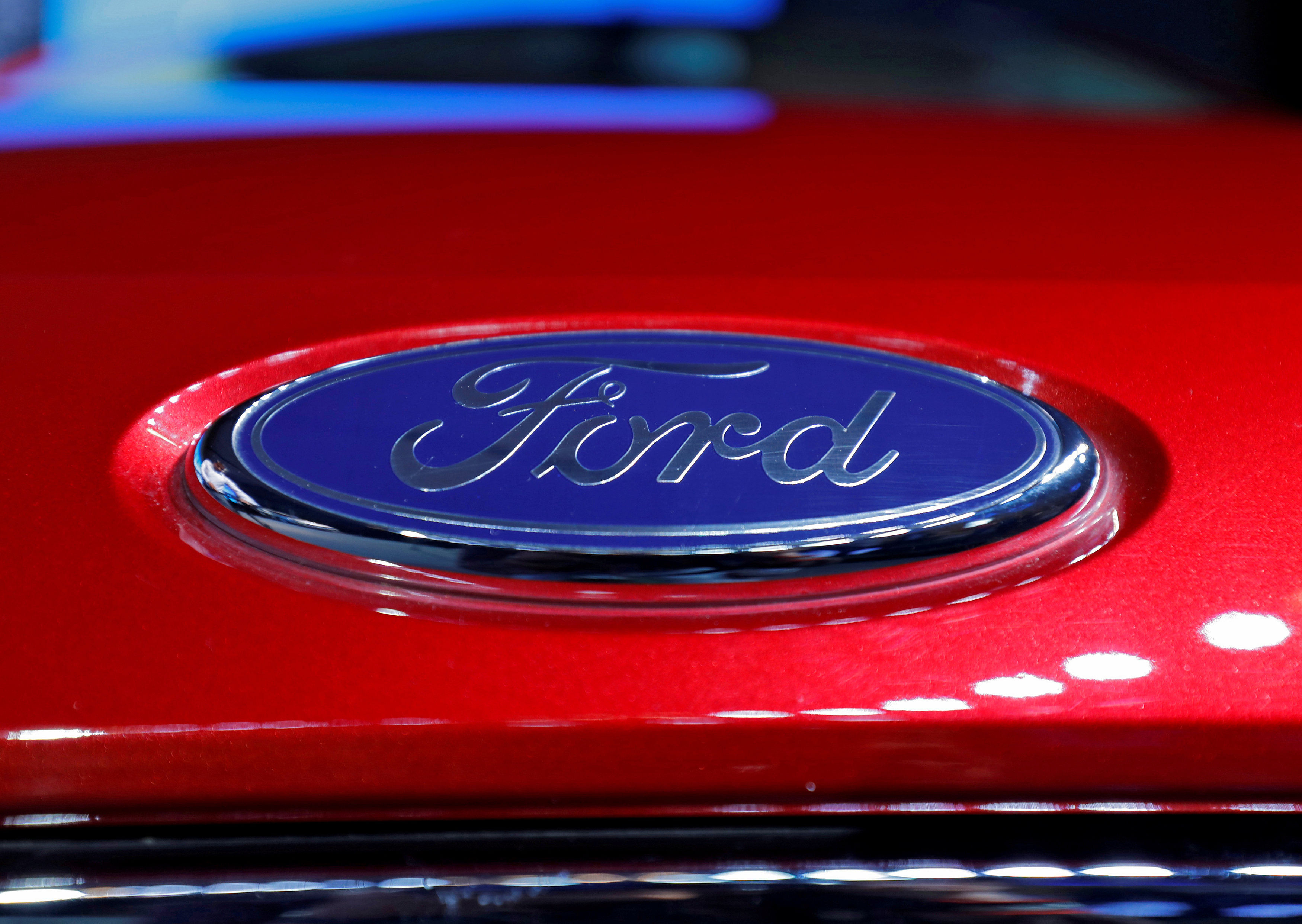 The logo is seen on the bonnet of a new Ford Aspire car during its launch in New Delhi, India. (Reuters Photo)