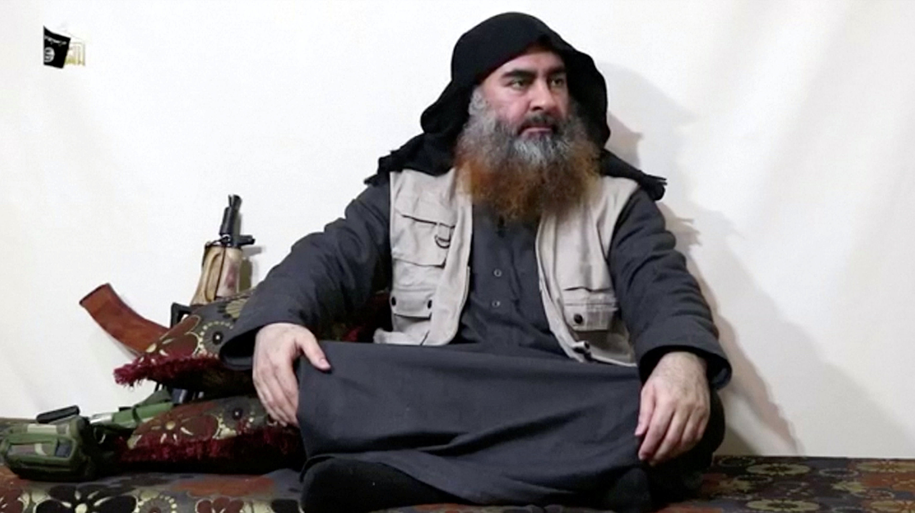 A bearded man with Islamic State leader Abu Bakr al-Baghdadi's appearance speaks in this screen grab taken from video released. (Reuters Photo)