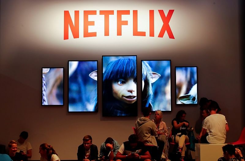 Gamers and visitors take a rest at the booth of Netflix during Europe's leading digital games fair Gamescom, which showcases the latest trends of the computer gaming scene in Cologne. (Reuters Photo)