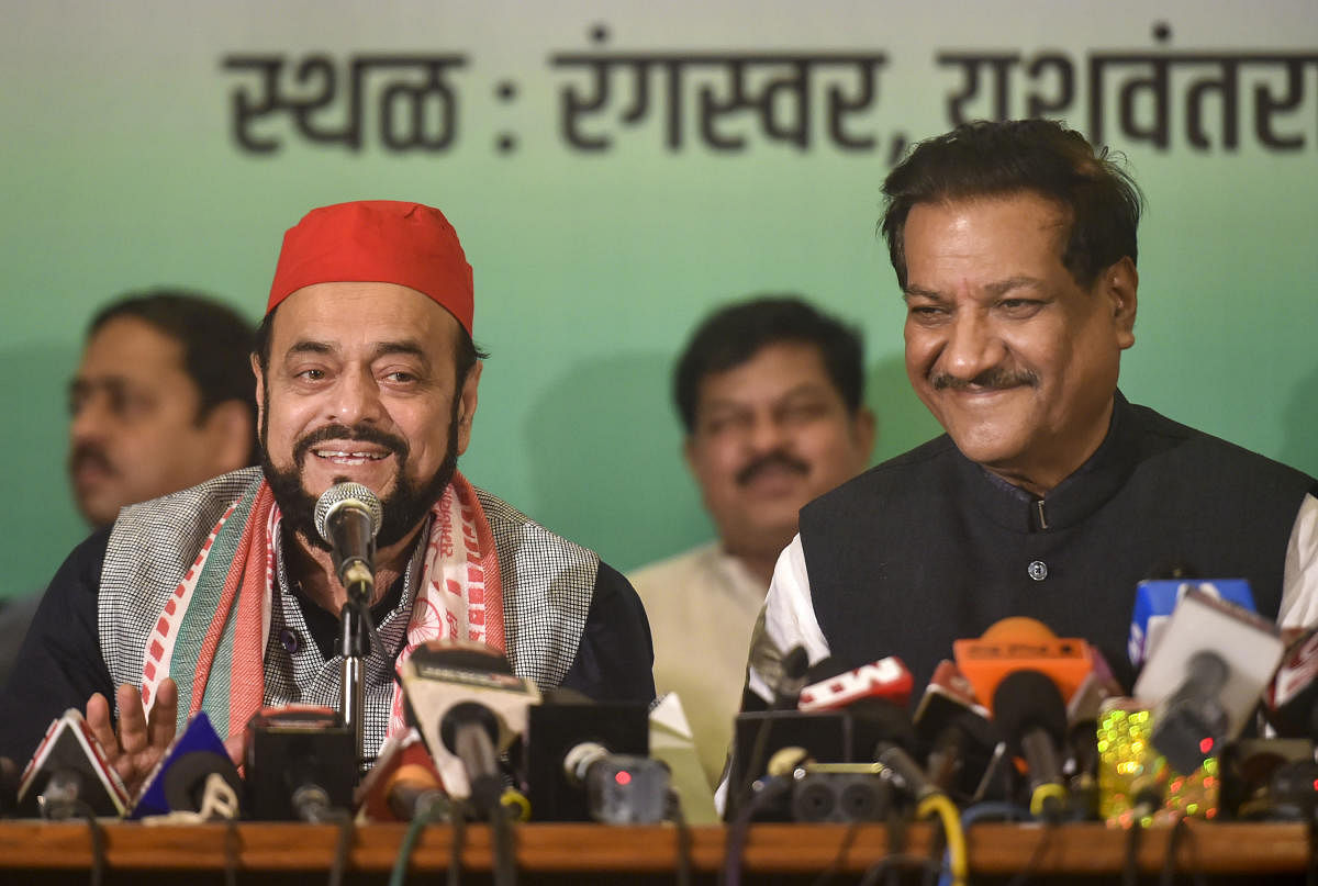 Samajwadi Party MLA Abu Azmi (L) and Congress leader Prithviraj Chavan. PTI file photo