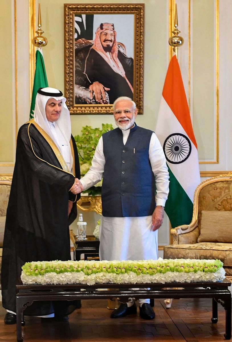 Prime Minister Narendra Modi with Saudi Arabia’s Minister of Environment, Water and Agriculture Abdulrahman bin Abdulmohsen Al Fadley (PTI Photo)