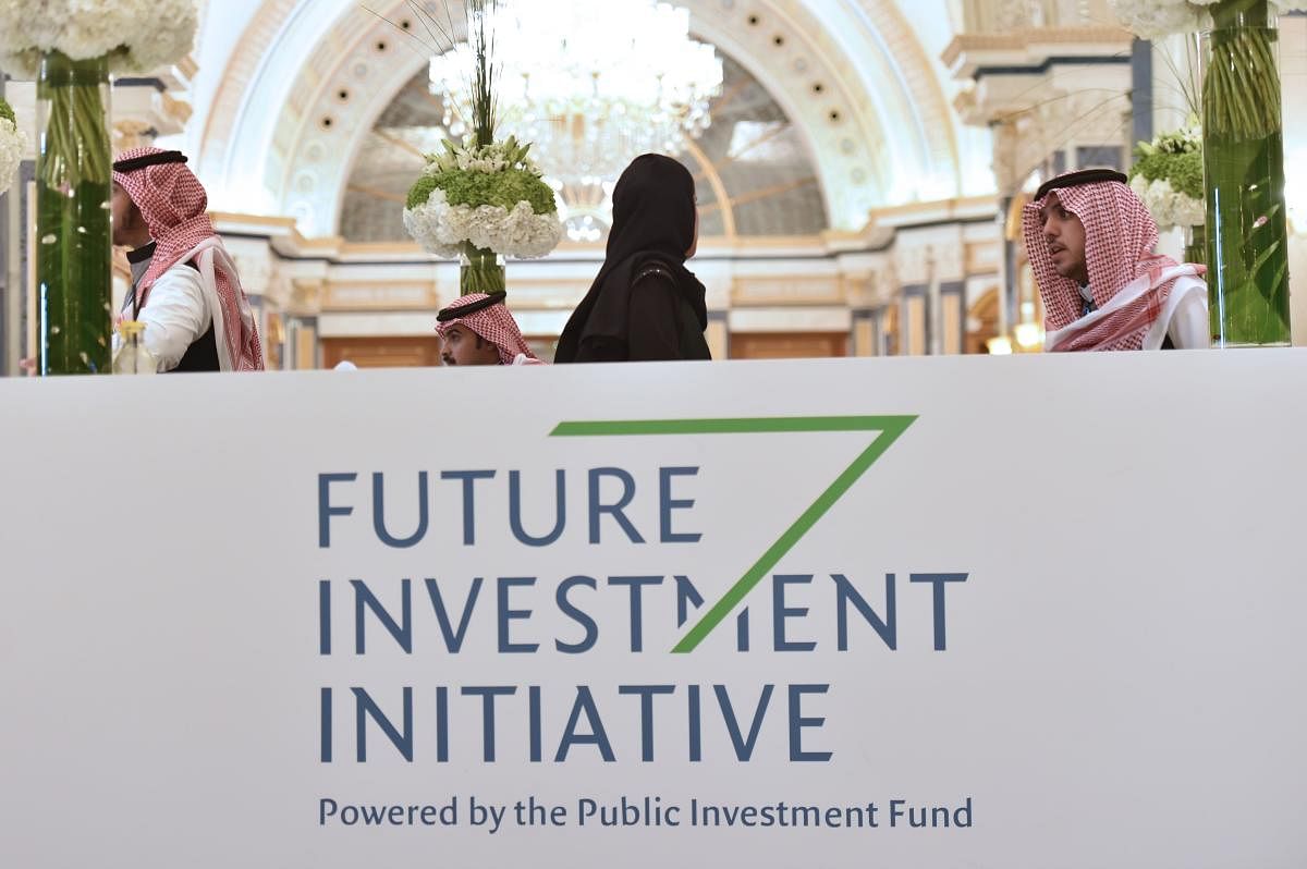 Local staff and delegates are pictured at the King Abdulazziz Conference Centre in Saudi Arabia's capital Riyadh to attend the Future Investment Initiative (FII) forum on October 29, 2019. ( AFP)