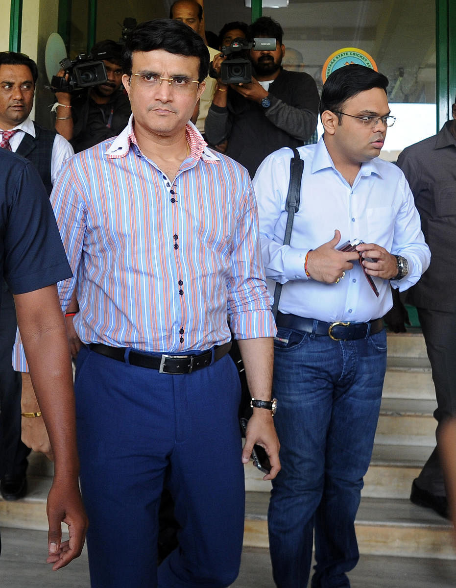 BCCI president Sourav Ganguly (left) and secretary Jay Shah arrive at the Chinnaswamy Stadium to meet NCA head Rahul Dravid. DH PHOTO/ PUSHKAR V