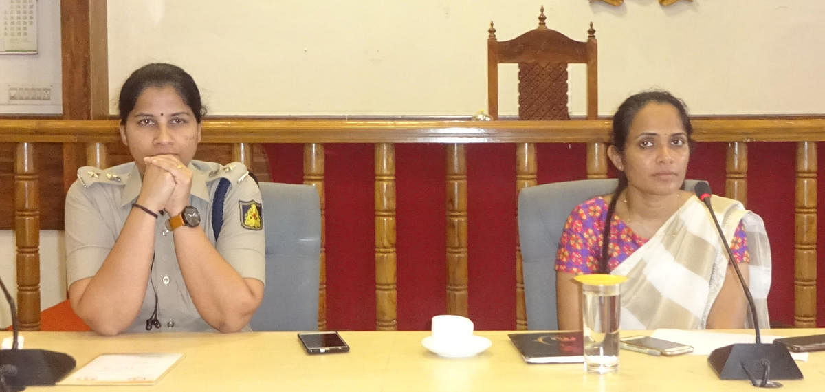Deputy Commissioner Annies Kanmani Joy chairs the River Rafting Committee meeting at her office in Madikeri on Wednesday. Superintendent of Police Dr Suman D Pennekar looks on.