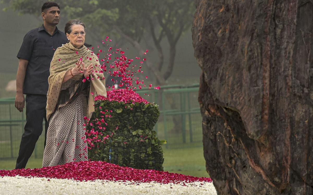 Congress President Sonia Gandhi pays floral tribute to former prime minister Indira Gandhi on her death anniversary at Shakti Sthal. PTI
